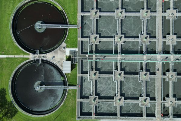Aerial view of a modern wastewater treatment plant with filtration tanks